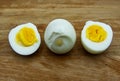 Boiled egg with a cut boiled egg on wooden table Royalty Free Stock Photo