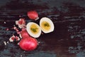 Boiled egg cut in half lying on the old blue table. Royalty Free Stock Photo