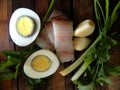 Boiled egg, green onions with bacon, parsley and garlic Royalty Free Stock Photo