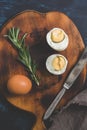 Boiled egg halves on a cutting board. Royalty Free Stock Photo