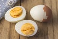 Boiled egg on rustic wooden table - hardboiled egg slic