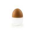 Boiled egg isolated on white background. Boiled Egg in Eggcup. Close-up of an egg isolated on white background. Single brown chick Royalty Free Stock Photo