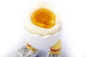 Boiled egg open half with legs isolate Royalty Free Stock Photo