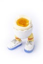 Boiled egg open half with legs isolate Royalty Free Stock Photo