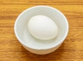 Boiled egg served in plate isolated on table top view of indian and pakistani spicy food