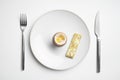 Boiled egg and toast soldiers on plate with knife and fork Royalty Free Stock Photo