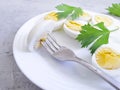 Boiled eggs on a plate, delicious parsley nutrient appetizer diet morning Royalty Free Stock Photo