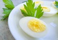 Boiled eggs on a plate, parsley nutrient diet Royalty Free Stock Photo