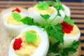 Boiled eggs with red caviar. Royalty Free Stock Photo