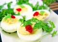 Boiled eggs with red caviar Royalty Free Stock Photo