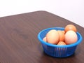 Boiled eggs was placed in the blue basket - some broken