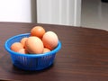 Boiled eggs was placed in the blue basket - some broken