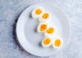 Boiled eggs on a white plate top view Royalty Free Stock Photo