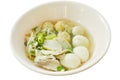 Boiled fish and shrimp ball topping slice pork in clear soup on bowl Royalty Free Stock Photo