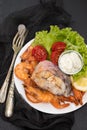 Boiled fish with shrimps and salad on white dish Royalty Free Stock Photo
