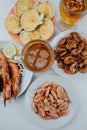 Boiled and fried shrimps, baked scallops, fried langusts and beer