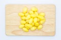 Boiled Ginkgo nut on wooden board, top view