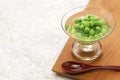 Boiled green peas and then soaked in Japanese dashi soup