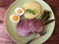 Boiled Ham or Holiday ham with potato puree, easter eggs and gherkins