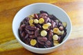 Boiled hot red bean and lotus seed in syrup on bowl Royalty Free Stock Photo