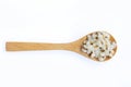 Boiled Job`s tears or adley or Coix lacryma-jobi in wooden spoon is a very nutritious cereal. The seeds are rich in minerals, Royalty Free Stock Photo