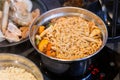Boiled Korean Instant Noodle inside hot pot with vegetables and meats Royalty Free Stock Photo