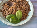 Boiled lentils in a ceramic plate taken from a very close distance