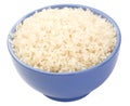 Boiled long grain rice in a lilac bowl close-up is
