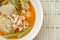 Boiled mixed vegetable and fish egg in Thai spicy soup on bowl Royalty Free Stock Photo