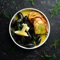 Boiled mussels with cheese sauce and garlic. Royalty Free Stock Photo