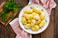 Boiled new potato with butter, dill and green onion Royalty Free Stock Photo