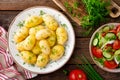 Boiled new potato with butter, dill and green onion Royalty Free Stock Photo