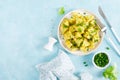 Boiled new potato with butter, dill and green onion Royalty Free Stock Photo
