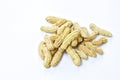 Boiled peanuts with peel on white background Royalty Free Stock Photo