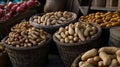 Boiled peanuts and snacks in market stall baskets. Royalty Free Stock Photo