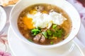 Boiled pork porridge with soft-boiled eggs. Royalty Free Stock Photo