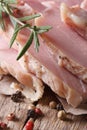 Boiled pork with spices and rosemary macro, vertical Royalty Free Stock Photo
