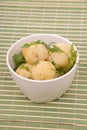 Boiled potatoes with parsley on a bamboo Royalty Free Stock Photo