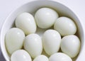 Boiled quail eggs on a white plate  on white background Royalty Free Stock Photo