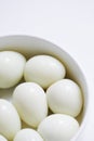 Boiled quail eggs on a white plate  on white background Royalty Free Stock Photo