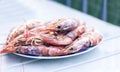 Boiled red shrimps prawns on the plate, seafood from the fish market of Catania, Sicily Royalty Free Stock Photo