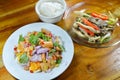 Boiled rice eat with spicy egg salad and stir fried Indian mushroom on table Royalty Free Stock Photo