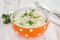 Boiled rice in orange bowl Royalty Free Stock Photo