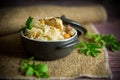 boiled rice with vegetables and meat in a ceramic bowl on a wooden table Royalty Free Stock Photo