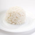 Boiled rice on a white plate