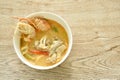 boiled river shrimp with chicken in Thai spicy herb soup or tom yum kung on bowl