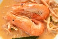 boiled river shrimp with herb in Thai spicy soup or tom yum kung on plate