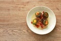 Boiled salty black preserved egg half cut with slice shallot salad on plate Royalty Free Stock Photo