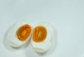 Boiled salty egg half cut on plate Royalty Free Stock Photo