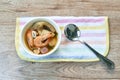 Boiled shrimp and dolly fish with mussel in Thai spicy tom yum soup on bowl Royalty Free Stock Photo